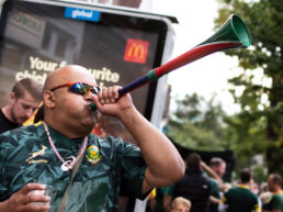 South Africa rugby fan blowing vuvuzela